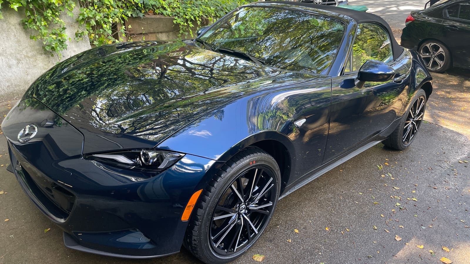 Dark blue Mazda MX-5 detailed by A & B Auto Detailing, paint polished to a mirror gloss