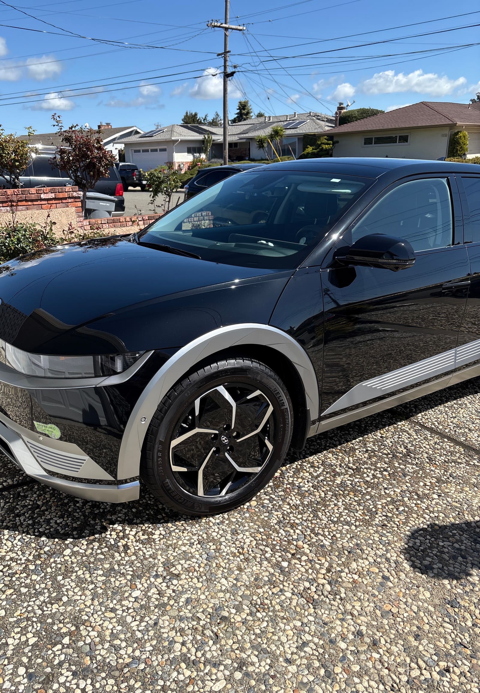 Black Hyundai Ioniq 5 on a driveway, paint polished after a detail
